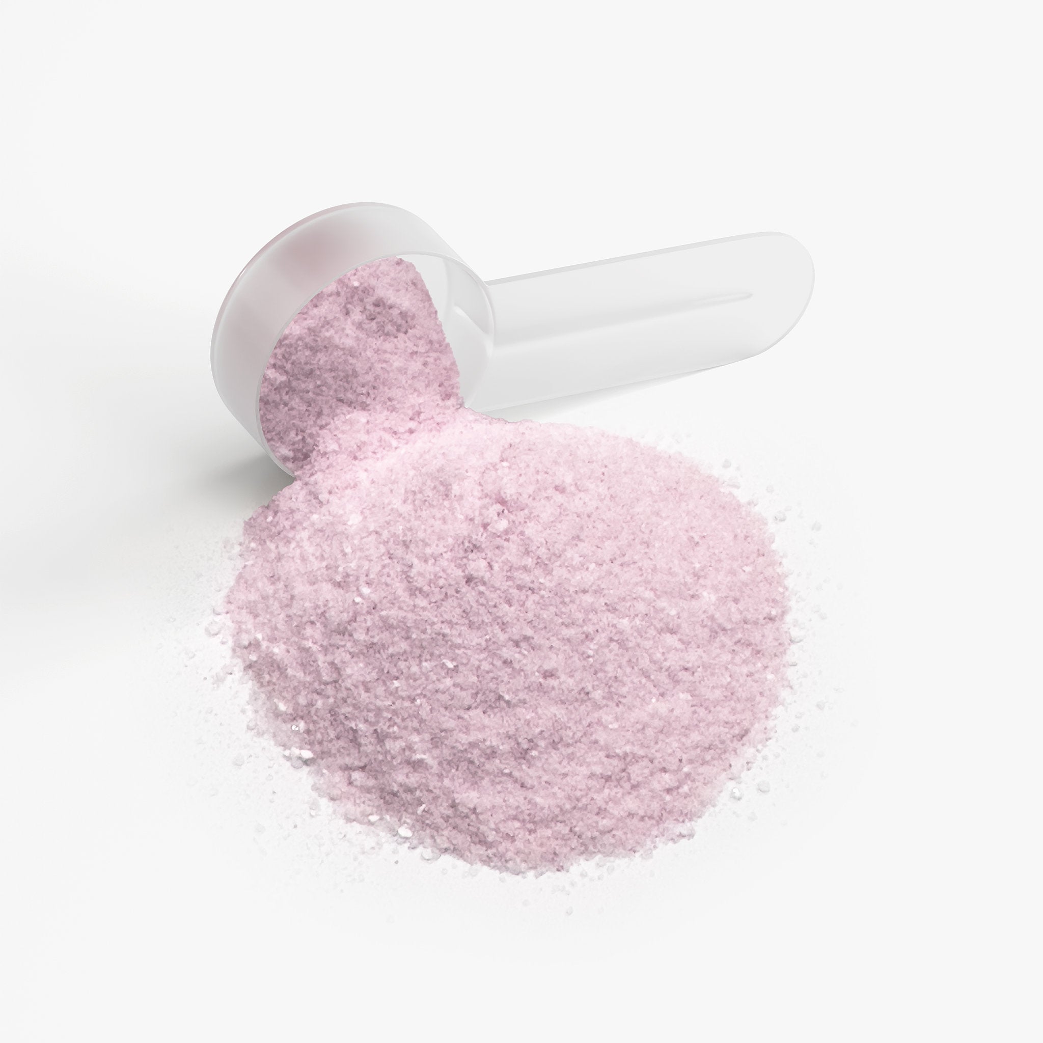 Pink powder in a white scoop on a white background